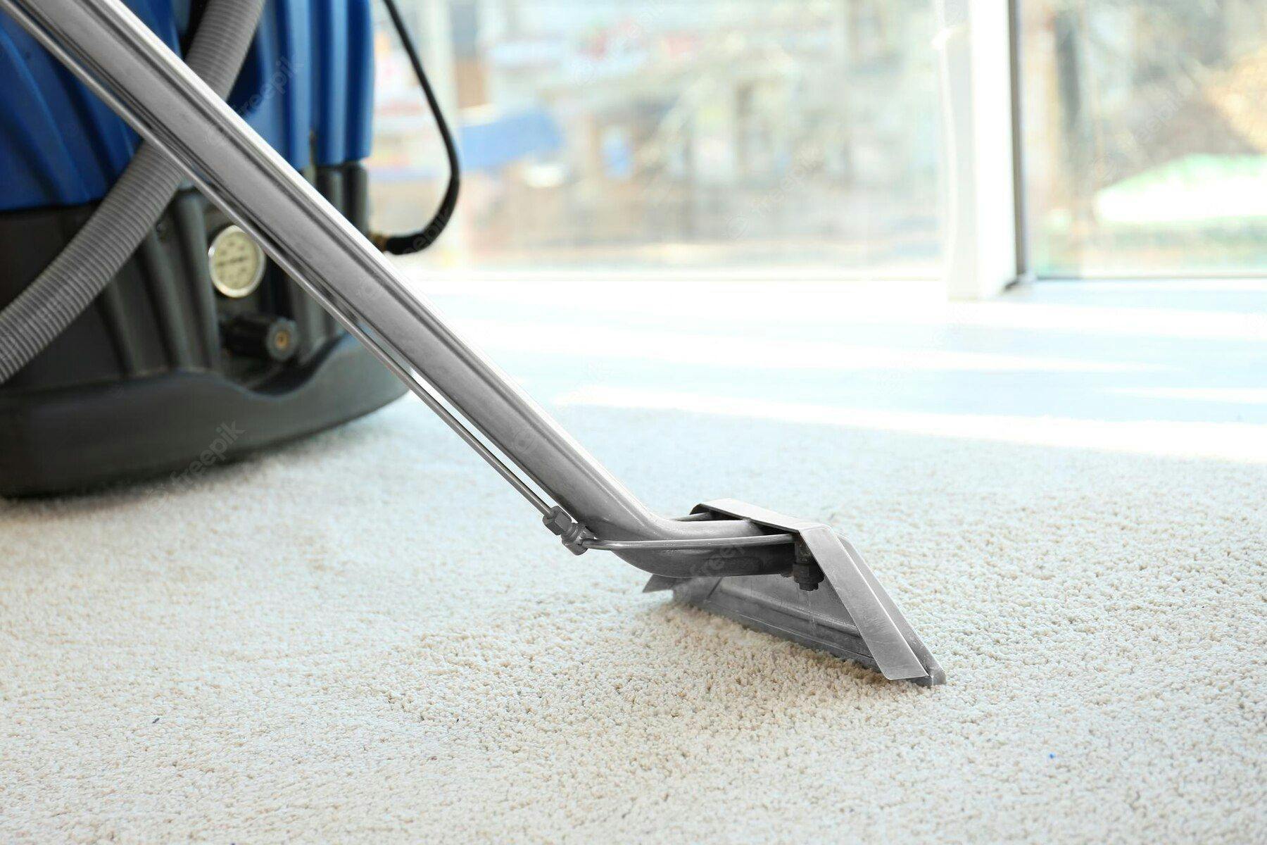 carpet being cleaned by machine